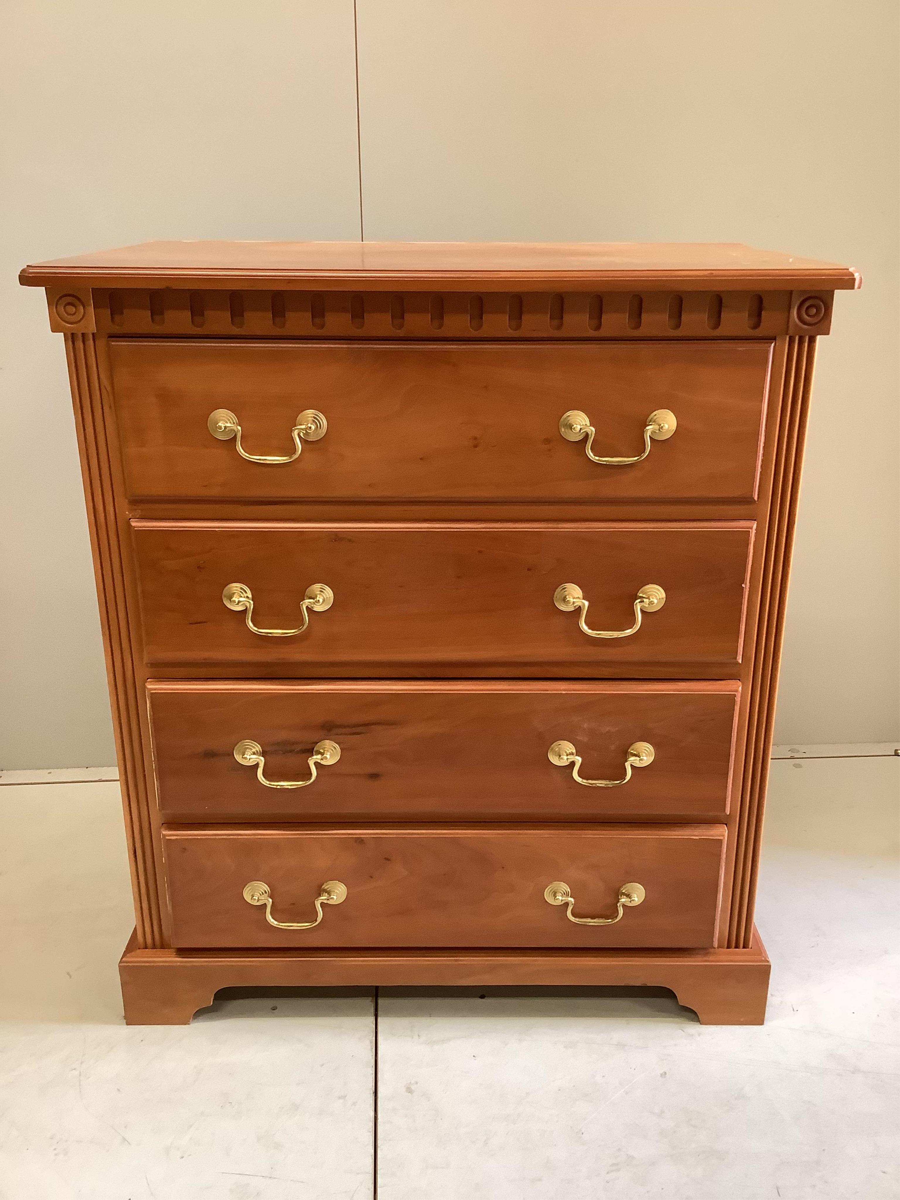 A reproduction cherry low chest of four drawers, width 82cm, depth 48cm, height 91cm. Condition - fair-good